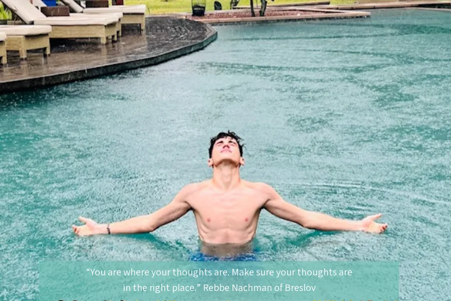 Yair Wolner, Gili's son. The text on the image reads: "You are where your thoughts are. Make sure your thoughts are in the right place." – Rebbe Nachman of Breslov